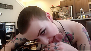 420 Tattooed Babe smokes while sucking cock