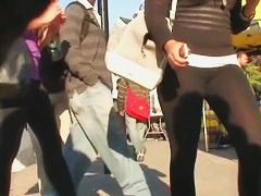 A black haired chick gets followed by a spy on the street