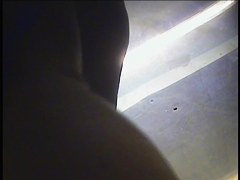 A milf in the girls changing room demonstrates herself