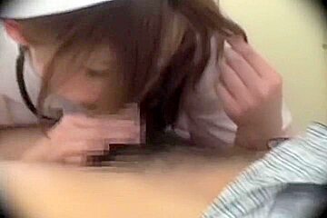 Adorable naughty burse gives her patient some oral fun