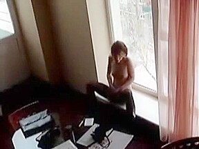 Amateur GF almost caught masturbating naked in the window of the office