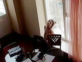 Amateur GF almost caught masturbating naked in the window of the office