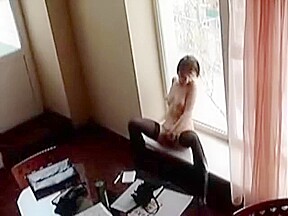 Amateur GF almost caught masturbating naked in the window of the office