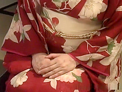 An older hottie in a kimono getting into hardcore bondage