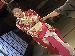 An older hottie in a kimono getting into hardcore bondage