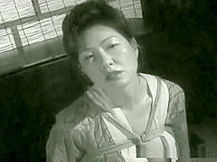 An older hottie in a kimono getting into hardcore bondage