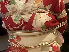 An older hottie in a kimono getting into hardcore bondage