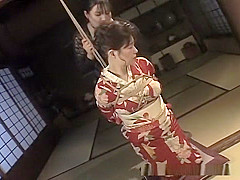 An older hottie in a kimono getting into hardcore bondage