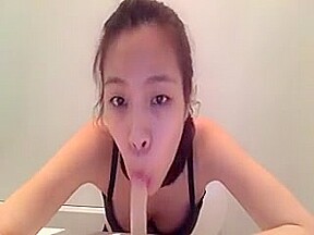 Asian Licking A Dildo Before Jamming It Deep In Her Pussy