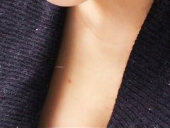 Asian business lady lets a downblouse peek in
