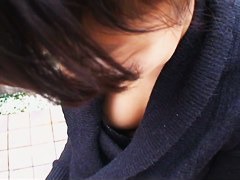 Asian business lady lets a downblouse peek in