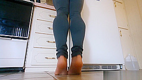 Barefeet calves in jeans
