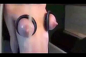Bitch gets her breasts tortured by a pump machine