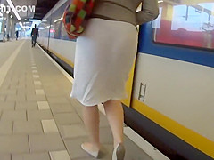 Black thong seen thru milf's skirt