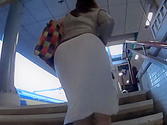 Black thong seen thru milf's skirt