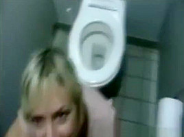 Blonde girl sucks dick in the bathroom