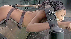 Bound black sub in yoke toyed as punishment