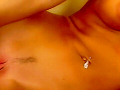 Busty Blondie Babe Is On Her Sofa Naked Teasing Her Pussy With A Sex Toy