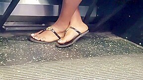 Candid ebony feet on the bus