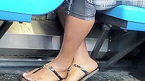 Candid ebony feet on the bus