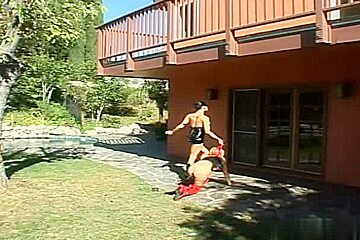 Carly Parker starts the scene off with her head wrapped in latex and