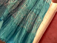 Changing room doll takes off her skirt and shows long legs