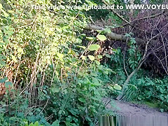 Chick bends over and exposes dark pussy