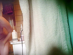 Chubby asian girl spied in bathroom