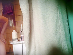 Chubby asian girl spied in bathroom