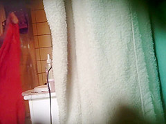 Chubby asian girl spied in bathroom