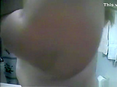 Chubby blonde taking off her clothes