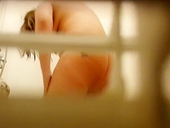 Chubby girl peeped while washing up