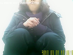 Chubby girl with hairy pussy pissing