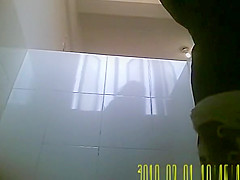 Chubby girl with hairy pussy pissing