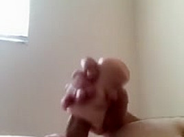 Chubby male beats his meat with a fake pussy and cums