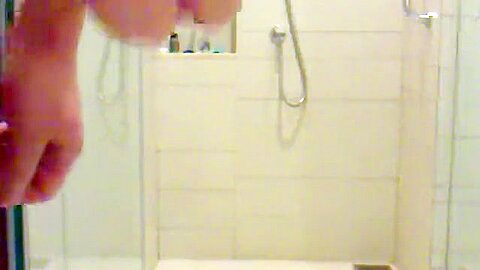 Clumsy serf beneath shower