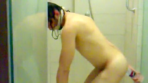 Clumsy serf beneath shower