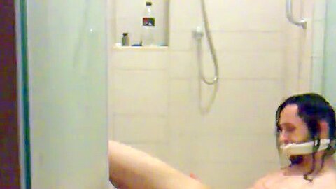 Clumsy serf beneath shower