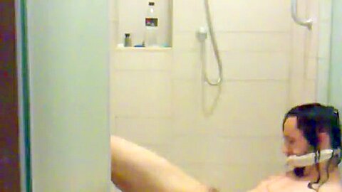 Clumsy serf beneath shower