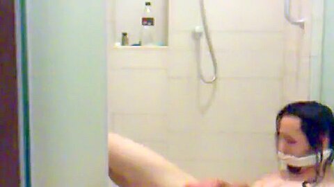Clumsy serf beneath shower