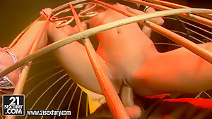 Crystal Crown is strip dancing in a cage