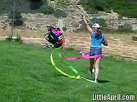 Cute Little April Outdoors Sucking A Popsicle