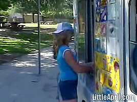 Cute Little April Outdoors Sucking A Popsicle