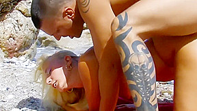 Dude fucks hot lesbian on beach
