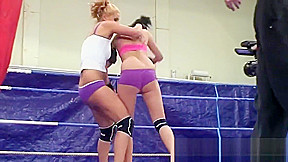Dyke babes wrestling in boxing ring