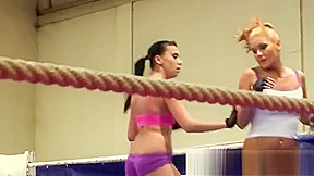 Dyke babes wrestling in boxing ring