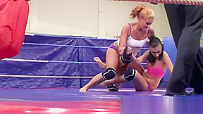 Dyke babes wrestling in boxing ring