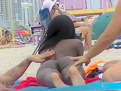 EXHIBITIONIST WIFE #98- HEATHER TAKES HER HUBBY HER GIRLFRIEND TO THE NUDE BEACH! POV