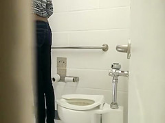 Ebony girl spied in public toilet peeing