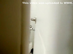 Ebony girl spied in public toilet peeing